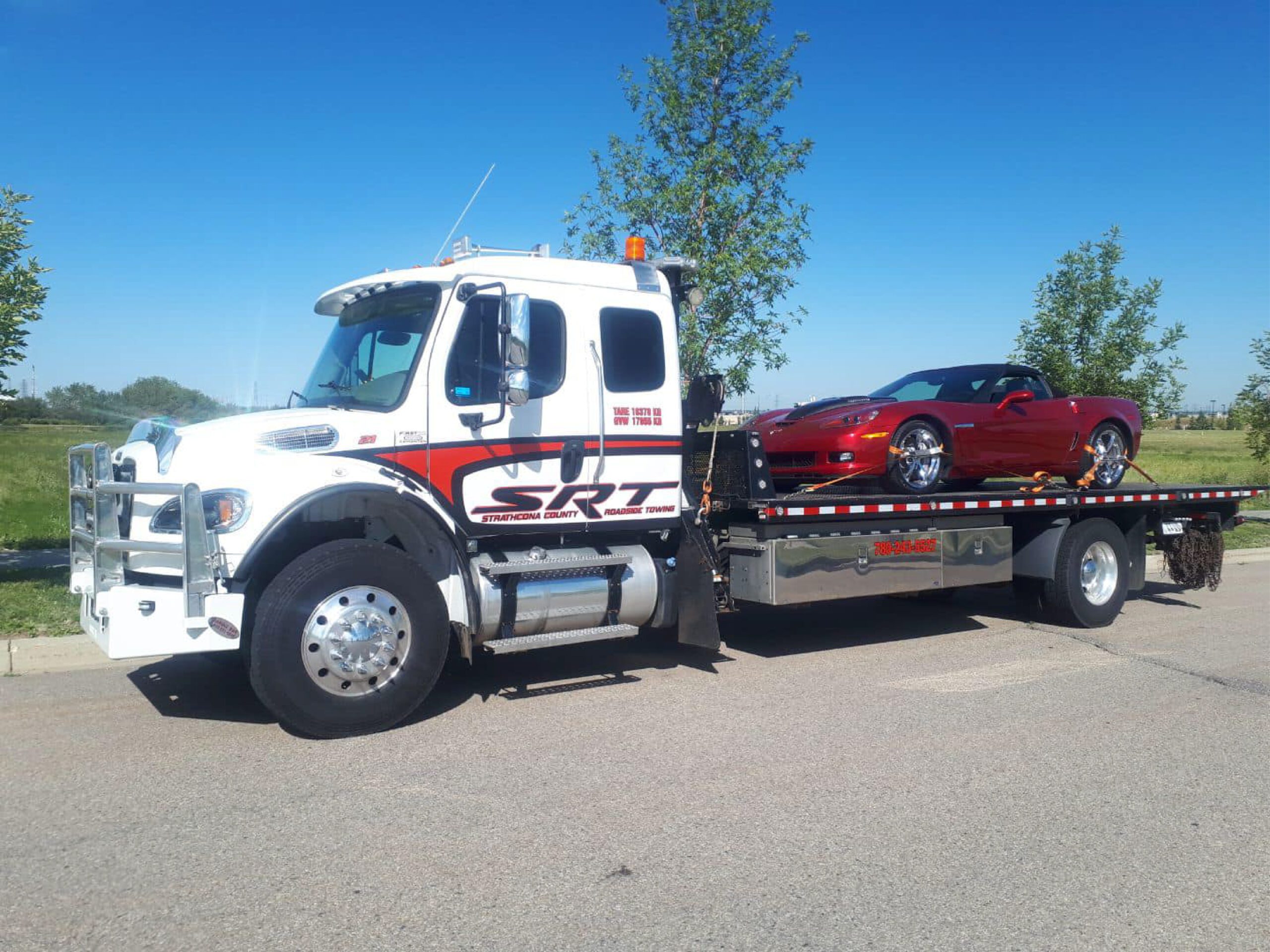 A Truck Carrying a Corvette